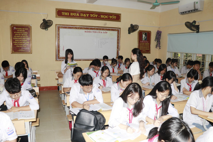 Học sinh lớp 9 của Trường THCS Quang Trung, thành phố Yên Bái tích cực ôn tập cho kỳ thi vào lớp 10. Ảnh: Tiến Khánh/TTXVN yen-bai-30525-22.jpg