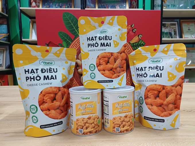 Hạt điều phô mai của Công ty TNHH Vinahe ở thị xã Phước Long, tỉnh Bình Phước cũ. Ảnh: K GỬIH/TTXVN Hạt điều phô mai của Công ty TNHH Vinahe ở thị xã Phước Long, tỉnh Bình Phước cũ. Ảnh: K GỬIH/TTXVN