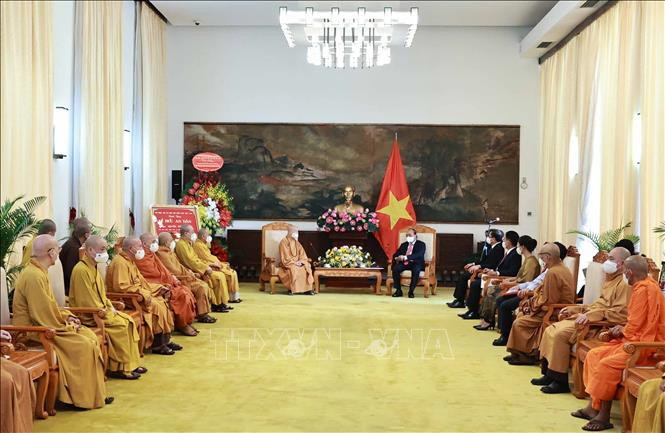 Chủ tịch nước Nguyễn Xuân Phúc với các đại biểu tại buổi tiếp. Ảnh: Thống Nhất – TTXVN