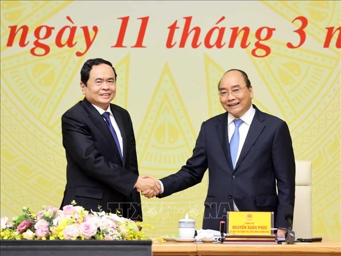 Thủ tướng Chính phủ Nguyễn Xuân Phúc và Chủ tịch Ủy ban Trung ương Mặt trận Tổ quốc Việt Nam Trần Thanh Mẫn dự hội nghị. Ảnh: Thống Nhất – TTXVN