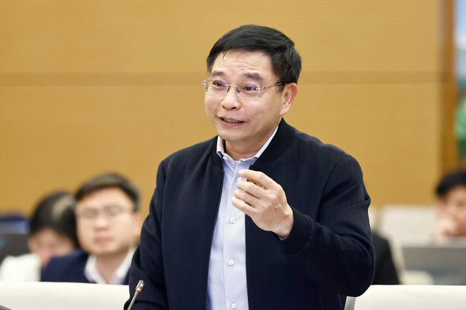 Bộ trưởng Bộ Tài chính Nguyễn Văn Thắng phát biểu. Ảnh: Doãn Tấn - TTXVN potal-ubtv-quoc-hoi-cho-y-kien-ve-du-an-tuyen-duong-sat-lao-cai-ha-noi-hai-phong-7848991.jpg