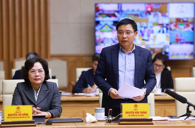 Bộ trưởng Bộ Tài chính Nguyễn Văn Thắng phát biểu. Ảnh: Dương Giang - TTXVN potal-thu-tuong-chu-tri-phien-hop-thu-hai-cua-ban-chi-dao-tw-trien-khai-xoa-nha-tam-nha-dot-nat-7802902.jpg
