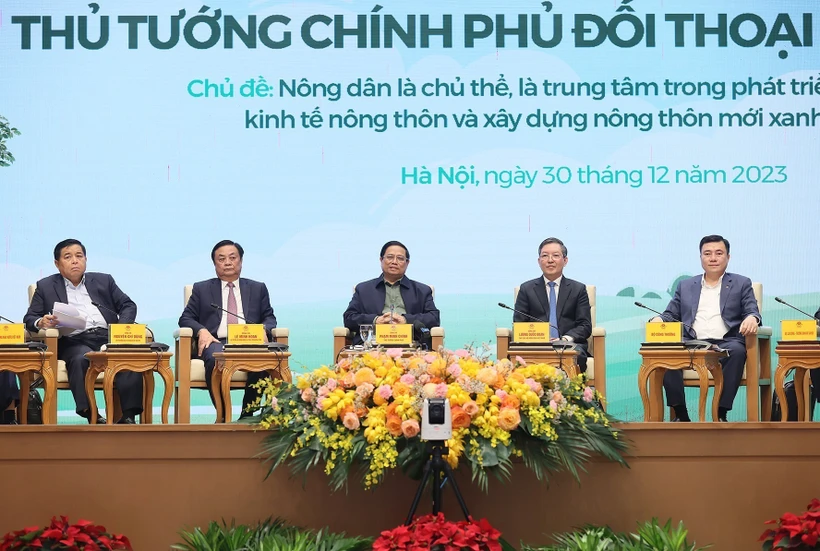Thủ tướng Chính phủ Phạm Minh Chính và đại diện các bộ, ngành đối thoại với nông dân. Ảnh: Dương Giang - TTXVN