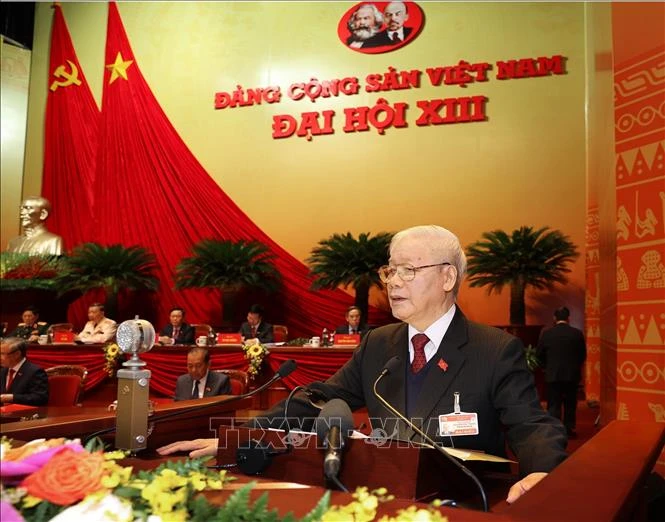 Đồng chí Nguyễn Phú Trọng, Tổng Bí thư Ban Chấp hành Trung ương Đảng, Chủ tịch nước CHXHCN Việt Nam đọc Báo cáo chính trị của Ban Chấp hành Trung ương Đảng khóa XII và các văn kiện trình Đại hội. Ảnh: TTXVN