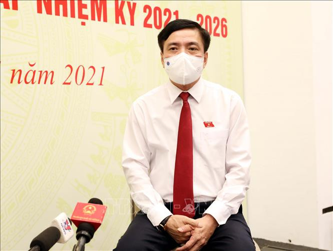 Tổng Thư ký, Chủ nhiệm Văn phòng Quốc hội, Chánh Văn phòng Hội đồng Bầu cử Quốc gia Bùi Văn Cường trả lời phỏng vấn các cơ quan thông tấn, báo chí. Ảnh: Phạm Kiên - TTXVN