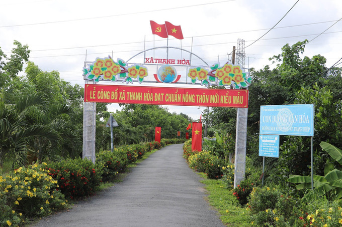Đường làng ngõ xóm xã Thanh Hoà, thị xã Cai Lậy, tỉnh Tiền Giang xanh - sạch - đẹp và ngày càng hiện đại. Ảnh: Minh Trí/TTXVN nong-thon-moi.jpg