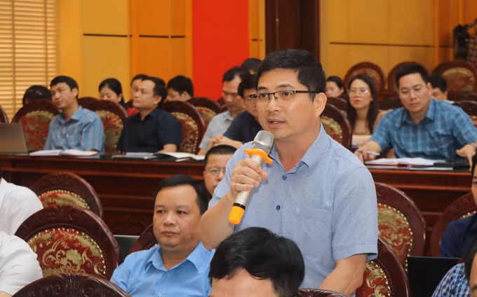 Lãnh đạo 37 xã, phường khu vực phía Bắc sau sáp nhập tỉnh báo cáo về khó khăn vướng mắc trong giai đoạn đầu vận hành mô hình chính quyền địa phương hai cấp cũng như trong việc xóa nhà tạm, nhà dột nát. Ảnh: Vũ Hoàng Giang/TTXVN