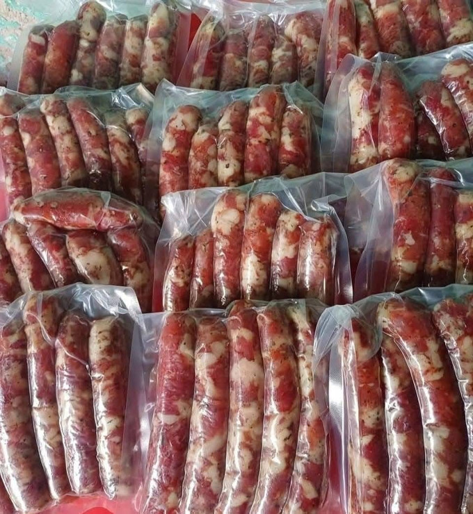 Lạp sườn nhà chị Dương Thị Huân được đóng túi hút chân không phục vụ du khách trong dịp Tết. Ảnh: Bnews/vnanet.vn