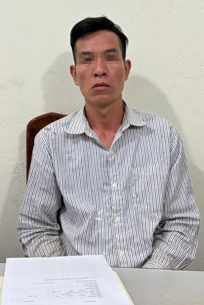 Đối tượng Triệu Văn Hình tại cơ quan Công an. Ảnh: TTXVN phát Đối tượng Triệu Văn Hình tại cơ quan Công an. Ảnh: TTXVN phát