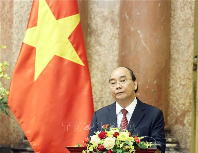 Chủ tịch nước Nguyễn Xuân Phúc phát biểu tại lễ trao quyết định. Ảnh: Thống Nhất – TTXVN Chủ tịch nước Nguyễn Xuân Phúc trao Quyết định bổ nhiệm Thẩm phán Tòa án nhân dân tối cao ảnh 2