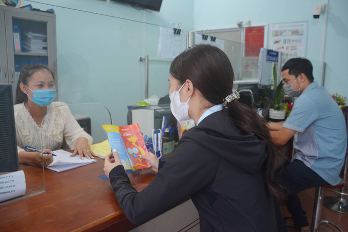 Các ngân hàng và tổ chức tín dụng trên địa bàn huyện Ea Kar luôn tạo điều kiện thuận lợi cho các hợp tác xã, tổ hợp tác vay vốn phát triển sản xuất. Ảnh: Hoài Thu Ea Kar phát triển kinh tế tập thể ảnh 3