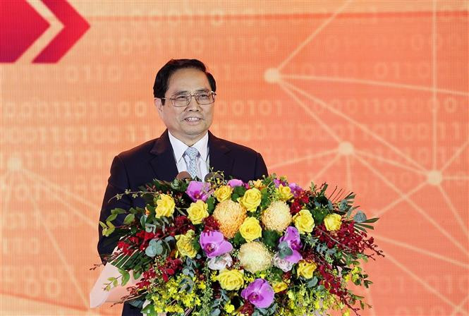 Thủ tướng Phạm Minh Chính phát biểu tại Diễn đàn Quốc gia phát triển doanh nghiệp công nghệ số. Ảnh: Dương Giang-TTXVN Thủ tướng Phạm Minh Chính: Chuyển đổi số phải góp phần làm người dân ngày càng hạnh phúc, đất nước thịnh vượng ảnh 3
