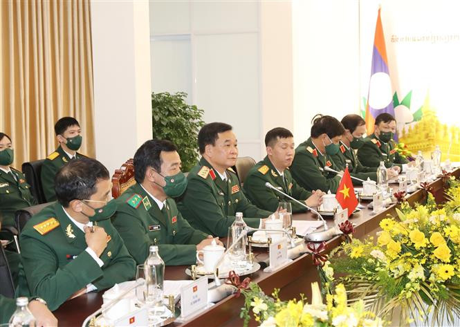 Thượng tướng Hoàng Xuân Chiến, Ủy viên Trung ương Đảng, Thứ trưởng Bộ Quốc phòng và đoàn Việt Nam tham dự Đối thoại. Ảnh: Trọng Đức - TTXVN Đối thoại Chính sách Quốc phòng Việt Nam - Lào lần thứ 2 ảnh 4