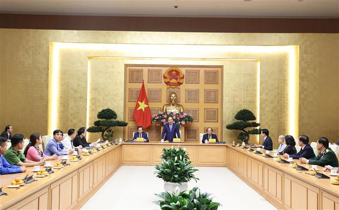 Quang cảnh buổi gặp mặt. Ảnh: Thống Nhất – TTXVN Thủ tướng Nguyễn Xuân Phúc gặp mặt đại biểu dự Lễ tuyên dương "Những tấm gương sáng thầm lặng vì cộng đồng" ảnh 1