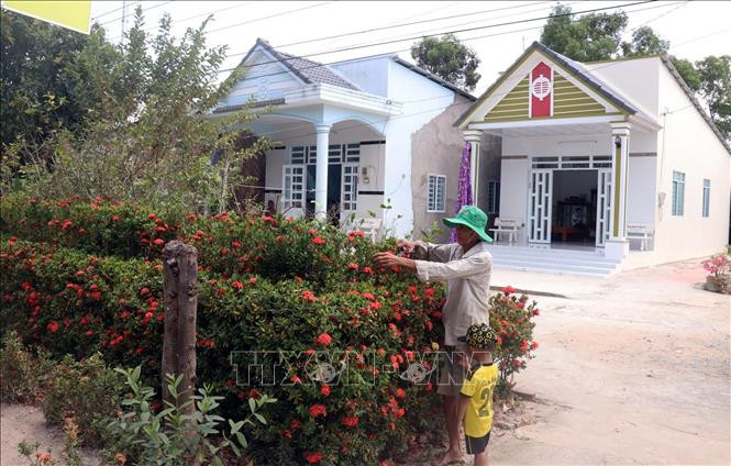Nhà dân xây dựng khang trang ở xã Thủy Liễu, huyện nông thôn mới Gò Quao (Kiên Giang). Ảnh: Lê Huy Hải – TTXVN Huyện Gò Quao (Kiên Giang) đạt chuẩn nông thôn mới ảnh 5