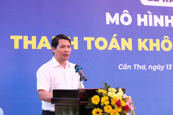 Ông Hà Vũ Sơn, Giám đốc Sở Công Thương thành phố Cần Thơ phát biểu tại lễ ra mắt mô hình Chợ 4.0 – Thanh toán không dùng tiền mặt. Ảnh: Thanh Liêm – TTXVN Cần Thơ có chợ đầu tiên thanh toán không dùng tiền mặt ảnh 2