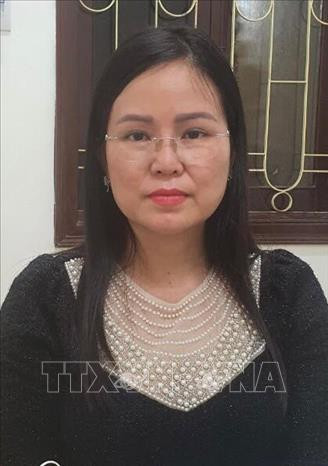 Bị can Nguyễn Thị Hương Lan, sinh năm 1974, tại Hà Nội; nghề nghiệp: Cục trưởng Cục Lãnh sự, Bộ Ngoại giao. Ảnh: TTXVN phát 92 năm thành lập Đảng: Dân là gốc (Bài 3) ảnh 2