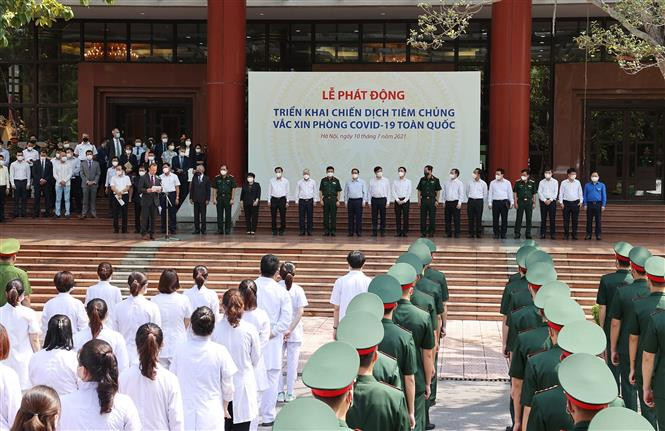 Quang cảnh buổi lễ. Ảnh: Dương Giang-TTXVN Thủ tướng Phạm Minh Chính: Nhiều người muốn ưu tiên vaccine phòng COVID-19 cho nơi dịch bệnh phức tạp ảnh 1