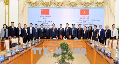 Thành phố Hồ Chí Minh và Trùng Khánh (Trung Quốc) thiết lập quan hệ thành phố hữu nghị