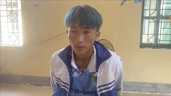 Đối tượng Vừ A Co tại cơ quan công an. Ảnh: TTXVN phát 