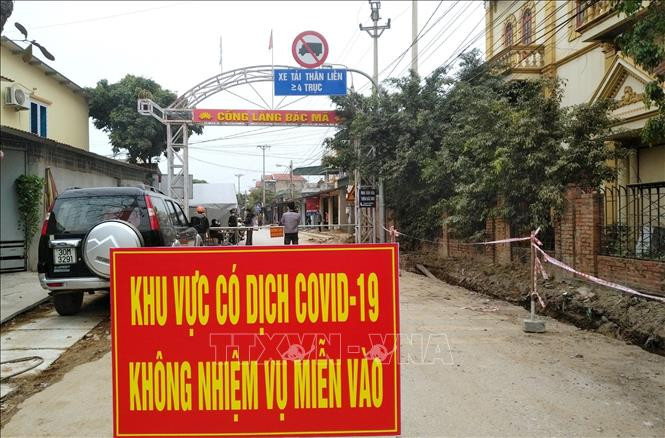 Chốt kiểm soát dịch tại xã Bình Dương (Đông Triều, Quảng Ninh). Ảnh: TTXVN phát