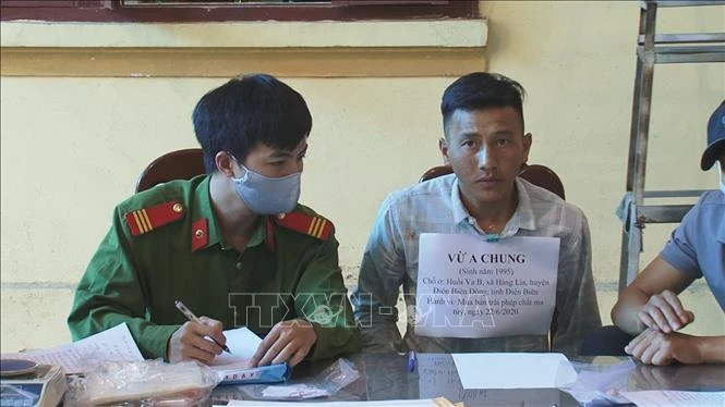 Đối tượng Vừ A Chung tại cơ quan Công an. Ảnh: Phan Tuấn Anh - TTXVN