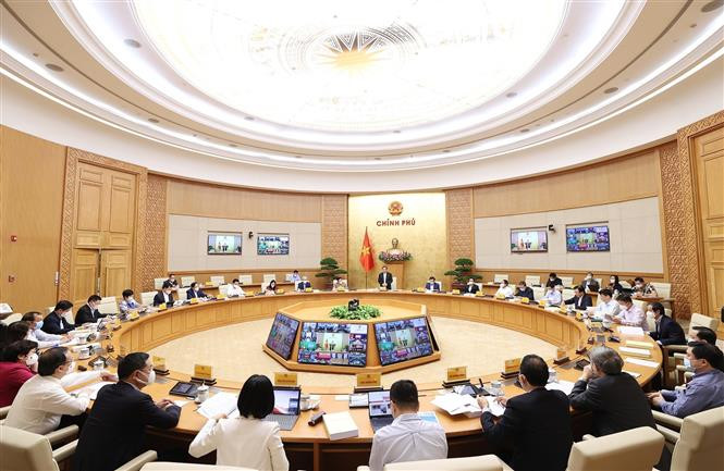 Quang cảnh hội nghị tại điểm cầu Chính phủ. Ảnh: Dương Giang-TTXVN 