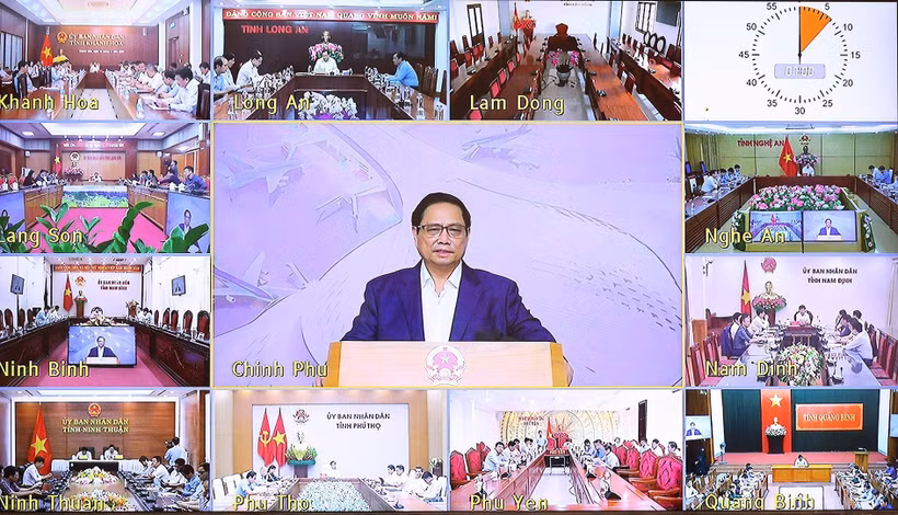 Thủ tướng Phạm Minh Chính chủ trì phiên họp trực tuyến tại điểm cầu Chính phủ. Ảnh: Dương Giang-TTXVN 