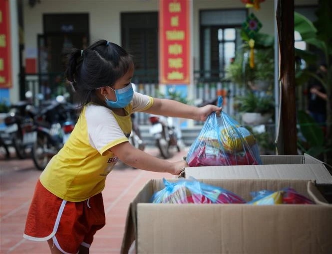 Các cháu nhỏ tại khu cách ly Trường mầm non xã Việt Tiến, huyện Việt Yên (Bắc Giang). Ảnh: Danh Lam - TTXVN