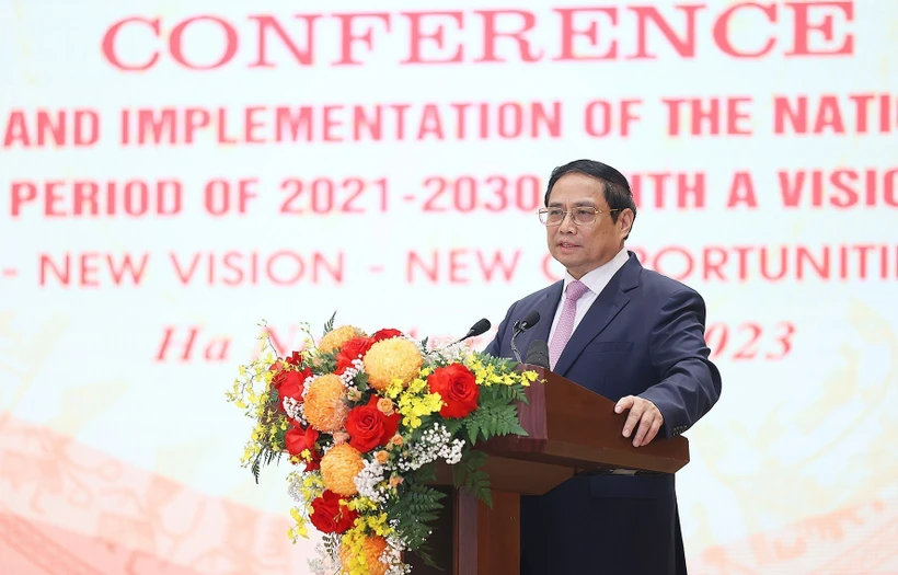 Thủ tướng Phạm Minh Chính đến dự Hội nghị công bố và triển khai Quy hoạch tổng thể quốc gia thời kỳ 2021-2030. Ảnh: Dương Giang-TTXVN 