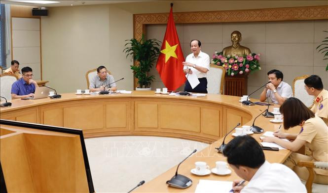 Bộ trưởng, Chủ nhiệm Văn phòng Chính phủ Mai Tiến Dũng chủ trì cuộc họp. Ảnh: Dương Giang - TTXVN