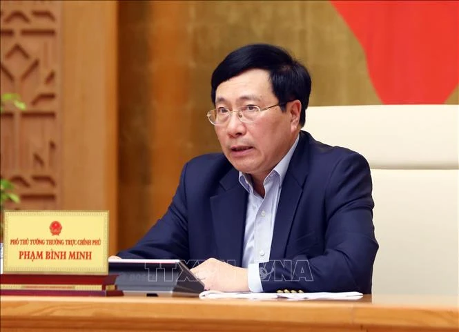 Phó Thủ tướng Thường trực Chính phủ, Phạm Bình Minh . Ảnh: Phạm Kiên - TTXVN 