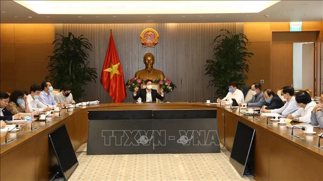 Phó Thủ tướng Chính phủ Vũ Đức Đam, Trưởng Ban Chỉ đạo Quốc gia phòng, chống dịch COVID-19 chủ trì cuộc họp. Ảnh: Văn Điệp - TTXVN