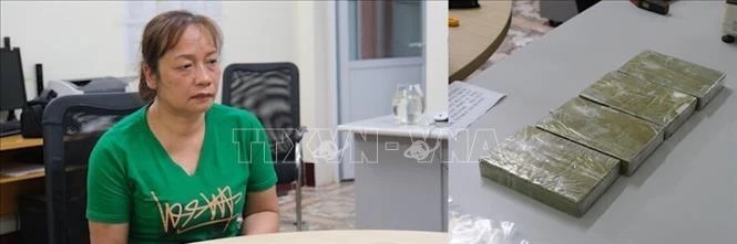 Một đối tượng và tang vật trong chuyên án 188H. Ảnh: TTXVN phát 