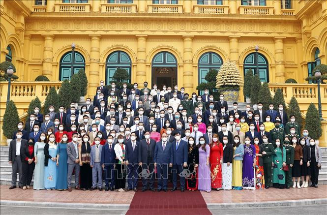 Chủ tịch nước Nguyễn Xuân Phúc gặp mặt cán bộ y tế tiêu biểu toàn quốc.Ảnh: Thống Nhất - TTXVN 