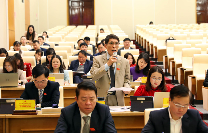 Các đại biểu thảo luận tại kỳ họp. Ảnh: Quang Cường/TTXVN