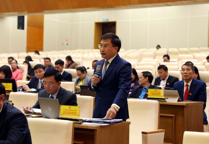 Các đại biểu thảo luận tại kỳ họp. Ảnh: Quang Cường/TTXVN