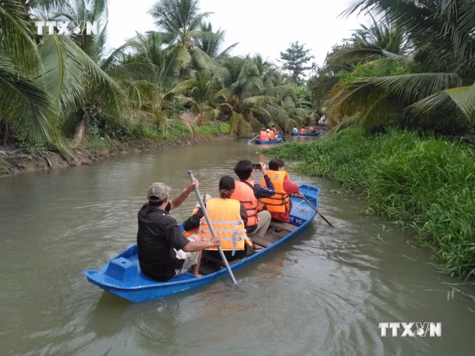 vna_potal_hieu_qua_tu_mo_hinh_san_xuat_nong_nghiep_gan_voi_du_lich_tai_tien_giang_6895168.jpg