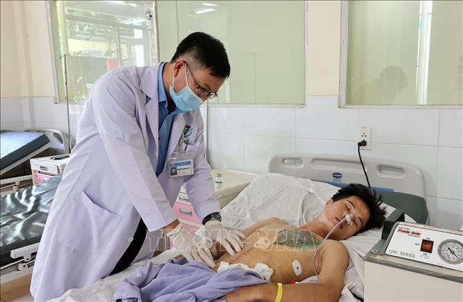 Sức khỏe bệnh nhân mắc hội chứng Pica đã ổn định sau phẫu thuật. Ảnh: TTXVN phát Bệnh viện Quân y 175 phẫu thuật, lấy ra khoảng 1 kg kim loại trong bụng một bệnh nhân ảnh 4