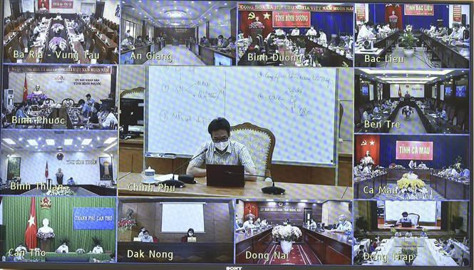 Họp giao ban trực tuyến. Ảnh: Minh Đức - TTXVN Phó Thủ tướng Vũ Đức Đam: Các tỉnh phía Nam giữ vững vùng an toàn, sẵn sàng cho tình huống xấu hơn ảnh 1