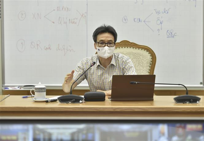 Phó Thủ tướng Vũ Đức Đam, Trưởng ban Chỉ đạo Quốc gia phòng, chống dịch COVID-19 phát biểu chỉ đạo. Ảnh: Minh Đức - TTXVN Phó Thủ tướng Vũ Đức Đam: Các tỉnh phía Nam giữ vững vùng an toàn, sẵn sàng cho tình huống xấu hơn ảnh 2