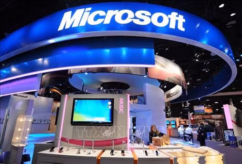Microsoft đầu tư xây dựng công nghệ AI giúp ứng phó với các thách thức toàn cầu. Ảnh: AFP/ TTXVN