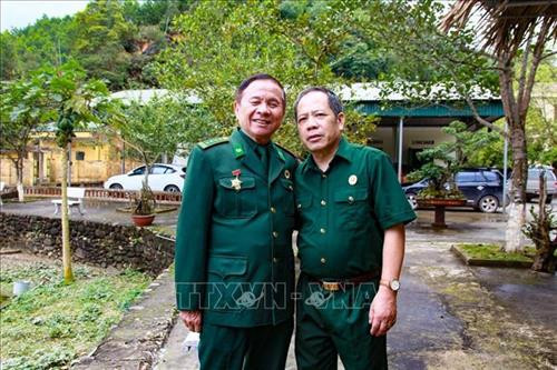 Đại tá Nguyễn Quang Vinh và người lính trinh sát Hoàng Như Lý, những cựu chiến binh của Đồn biên phòng Pò Hèn trong Cuộc chiến đấu bảo vệ biên giới phía Bắc năm 1979, về thăm lại chiến trường xưa, tháng 2/2019. Ảnh: Trung Nguyên-TTXVN Đại tá Nguyễn Quang Vinh và người lính trinh sát Hoàng Như Lý, những cựu chiến binh của Đồn biên phòng Pò Hèn trong Cuộc chiến đấu bảo vệ biên giới phía Bắc năm 1979, về thăm lại chiến trường xưa, tháng 2/2019. Ảnh: Trung Nguyên-TTXVN