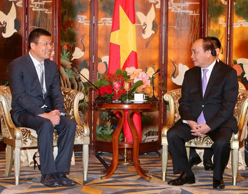 Thủ tướng Nguyễn Xuân Phúc tiếp ông Hong Tian Zhu, Chủ tịch Tập đoàn Texhong. Ảnh: Thống Nhất-TTXVN