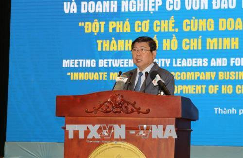 Ông Nguyễn Thành Phong, Chủ tịch UBND Thành phố Hồ Chí Minh phát biểu tại hội nghị. Ảnh: Xuân Anh – TTXVN Ông Nguyễn Thành Phong, Chủ tịch UBND Thành phố Hồ Chí Minh phát biểu tại hội nghị. Ảnh: Xuân Anh – TTXVN