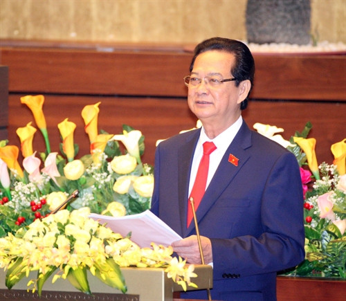Thủ tướng Nguyễn Tấn Dũng trình bày Báo cáo "Tình hình kinh tế-xã hội năm 2015 và 5 năm 2011-2015; Phương hướng nhiệm vụ 5 năm 2016-2020 và năm 2016". Ảnh: Thống Nhất – TTXVN