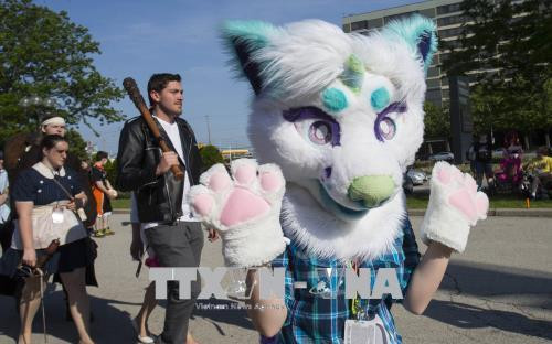 Các bạn trẻ hóa trang thành các nhân vật yêu thích tại lễ hội hóa trang Anime 2018 ở Toronto. THX/ TTXVN