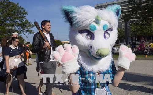 Các bạn trẻ hóa trang thành các nhân vật yêu thích tại lễ hội hóa trang Anime 2018 ở Toronto. THX/ TTXVN Các bạn trẻ hóa trang thành các nhân vật yêu thích tại lễ hội hóa trang Anime 2018 ở Toronto. THX/ TTXVN