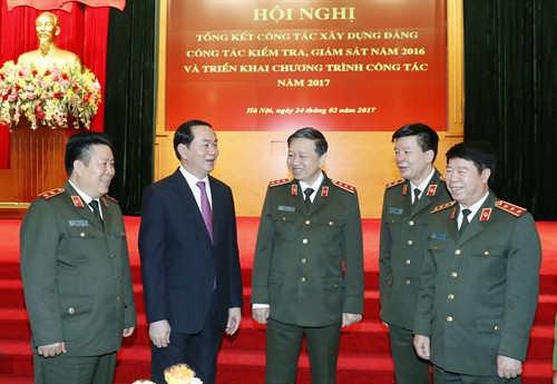 Chủ tịch nước Trần Đại Quang với các đại biểu dự Hội nghị. Ảnh: Nhan Sáng-TTXVN