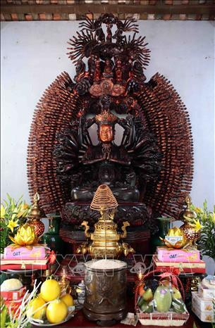 Bảo vật Quốc gia tượng Phật Quan Âm Thiên Thủ Thiên Nhãn được tạo tác vào đầu thế kỷ XIX. Ảnh: Phạm Kiên - TTXVN Bảo vật Quốc gia tượng Phật Quan Âm Thiên Thủ Thiên Nhãn được tạo tác vào đầu thế kỷ XIX. Ảnh: Phạm Kiên - TTXVN